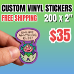 Limited-time deal on 200 custom 2” vinyl stickers with free shipping for $35. A hand holds a colorful die-cut sticker featuring a quirky alien character with a speech bubble on a purple gradient background. Designed for eye-catching branding, giveaways, and creative sticker projects.