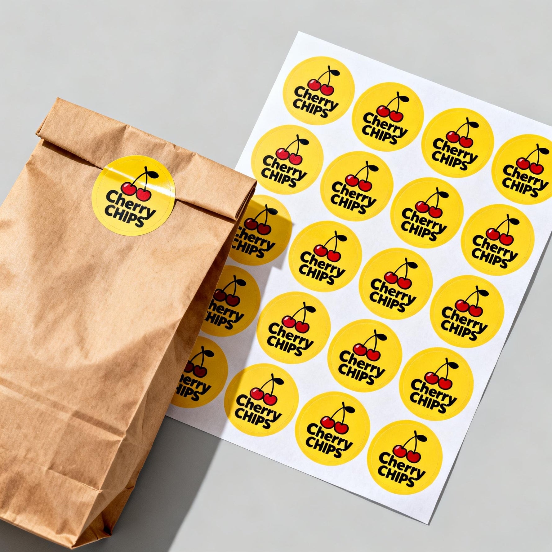 Circle sheet labels yellow round stickers with cherry logo for packaging and paper bags
