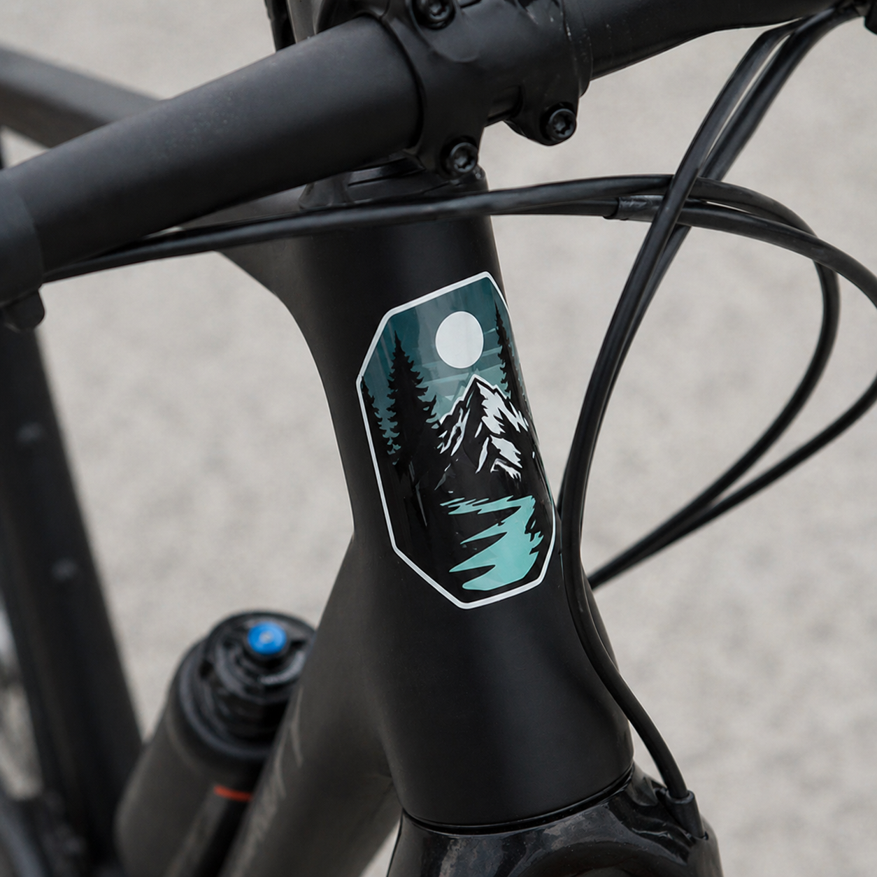 Custom bicycle sticker on bike frame – waterproof vinyl sticker for bikes with mountain design