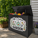 Custom outdoor decals with "Life is better in the Garden" design applied on a black outdoor storage box in a sunny backyard.