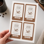 Custom rounded corner sheet labels for coffee packaging, featuring brown House Blend stickers printed on sheets for small business branding