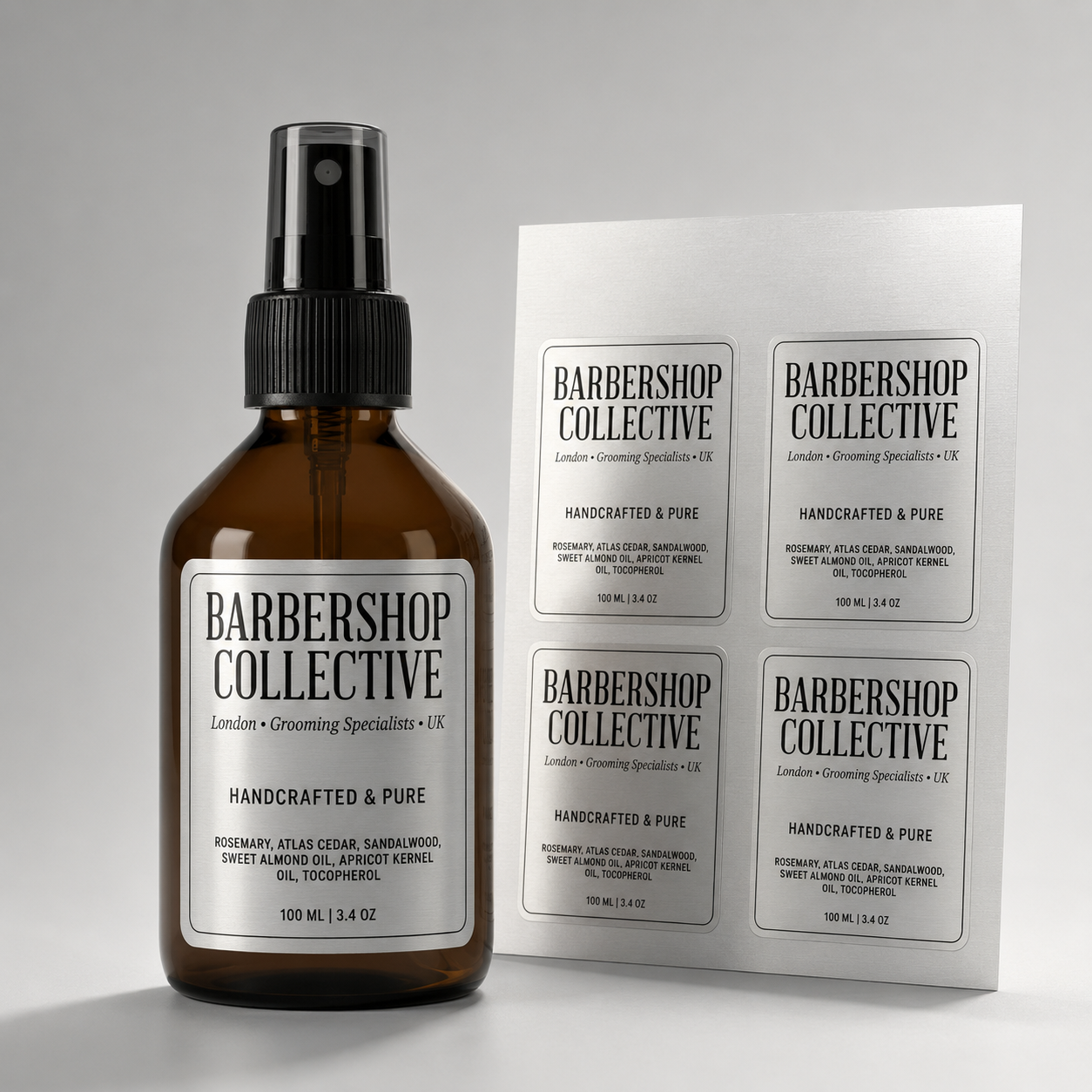 Custom silver foil labels on barbershop grooming product bottles, along with a silver sheet labels.