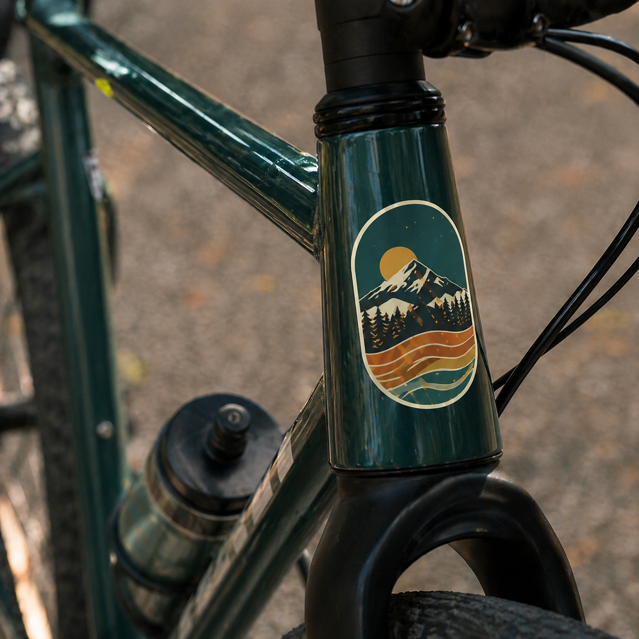 Custom bike stickers on bicycle frame – personalized bicycle decals with outdoor landscape design