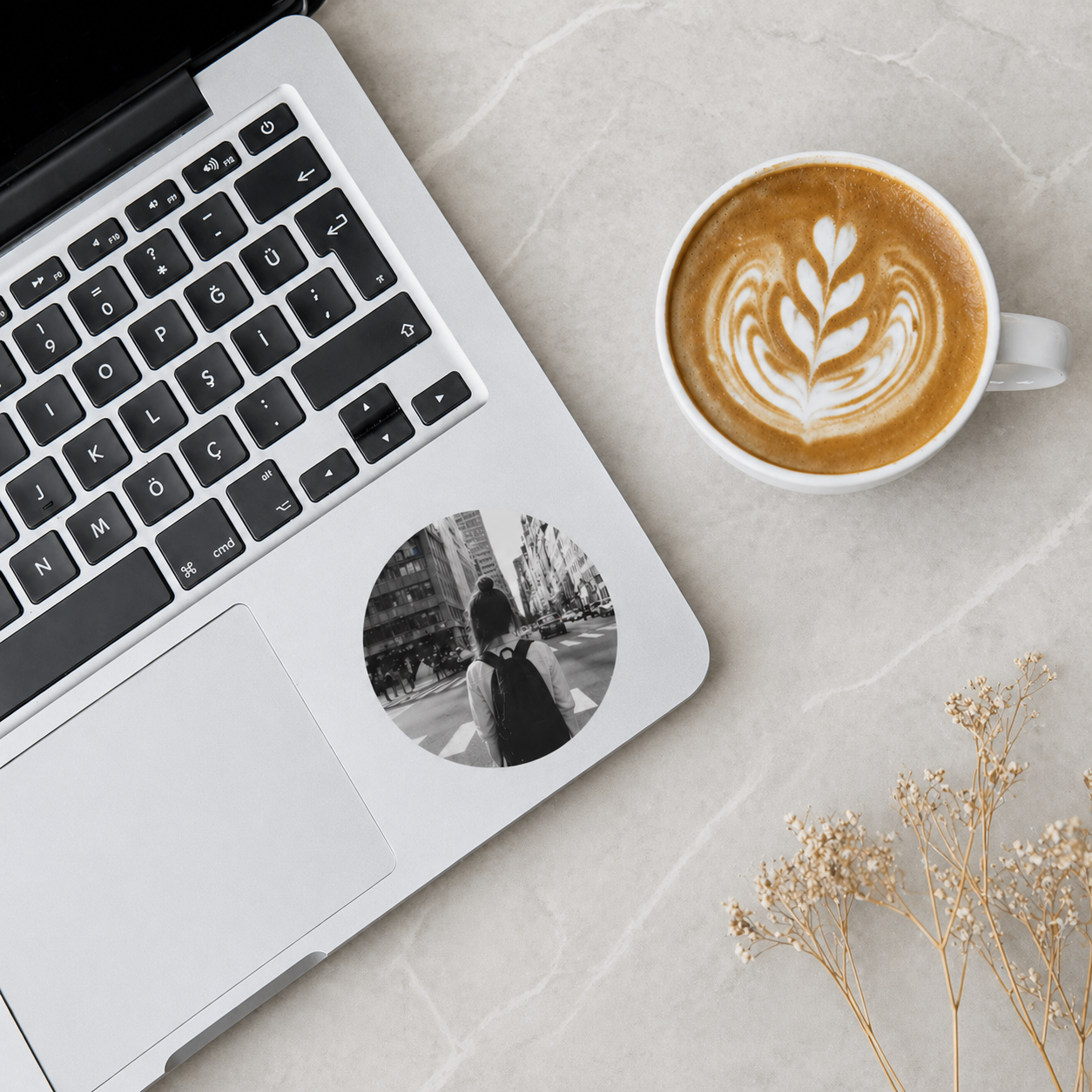 Custom photo stickers on laptop workspace – personalized stickers for laptops, cups, and everyday items