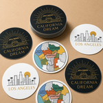 Collection of Los Angeles-themed circle stickers on a beige background