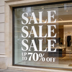Store window cling with 'SALE UP TO 70% OFF' sign, waterproof, and UV-resistant