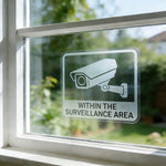 Security camera window cling decal applied on glass with surveillance notice removable static cling sign