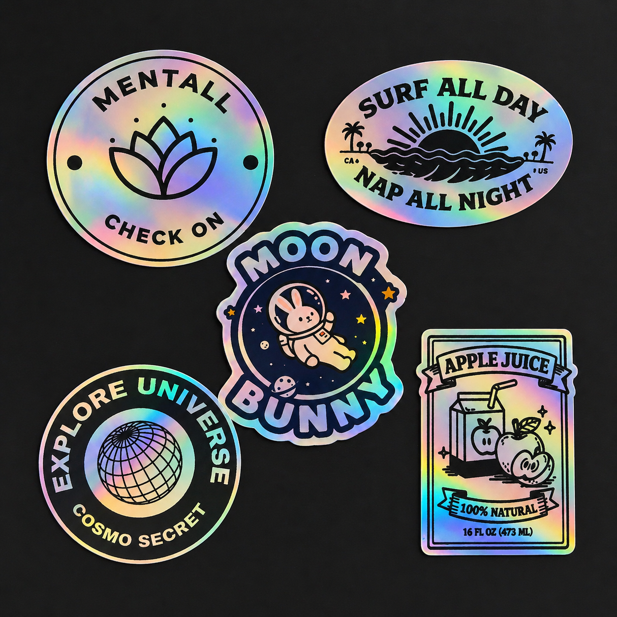 Set of colorful holographic stickers with various designs on a black background