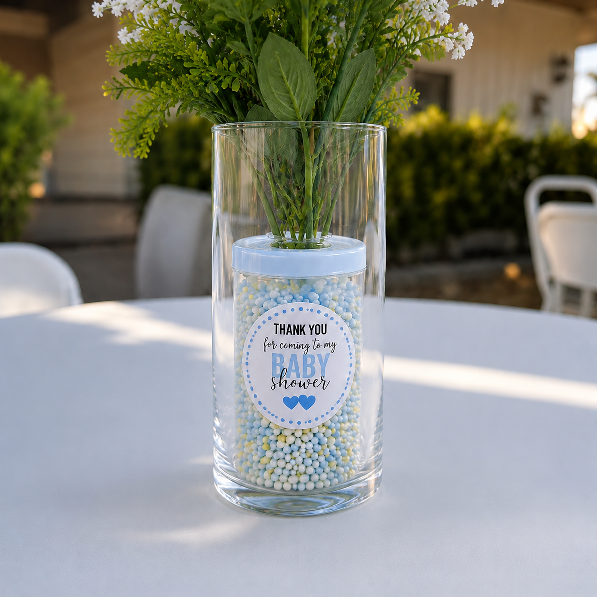 Baby shower thank you sticker applied to a clear gift jar for party decoration