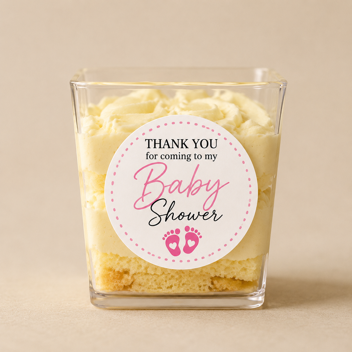 Custom baby shower sticker used on a dessert container for party treats