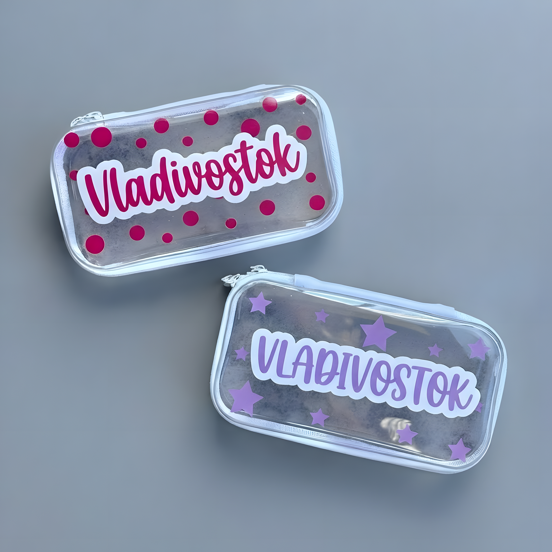 Two colorful personalized name stickers displayed on clear rectangular labels.
