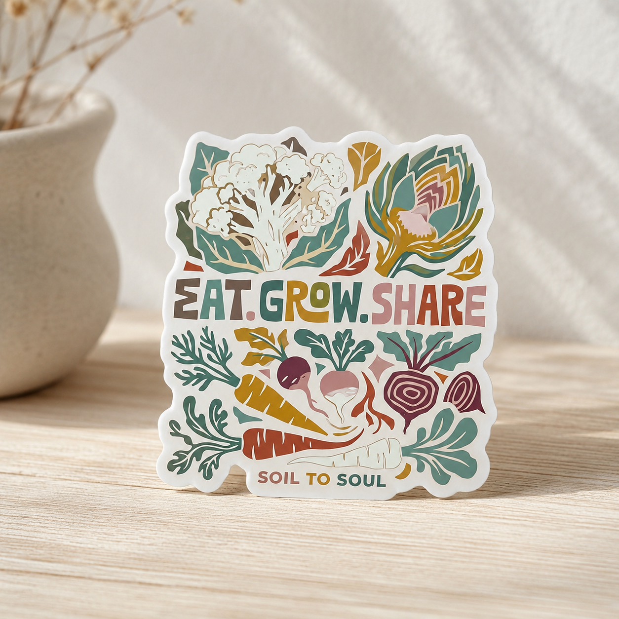 Custom botanical art sticker displayed on a wooden table in soft natural light