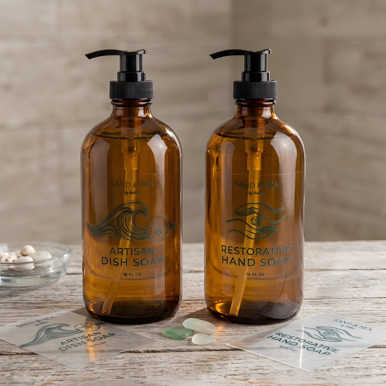 Custom clear stickers applied to amber glass dish soap and hand soap pump bottles, with matching labels displayed beside them.