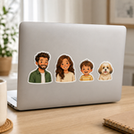 A set of custom family vinyl stickers applied to the back of a silver laptop, showing illustrated portraits of a father, mother, son, and a fluffy dog.