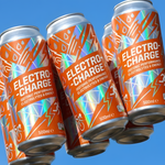 Custom holographic wraparound labels on orange energy drink cans against a bright blue background.