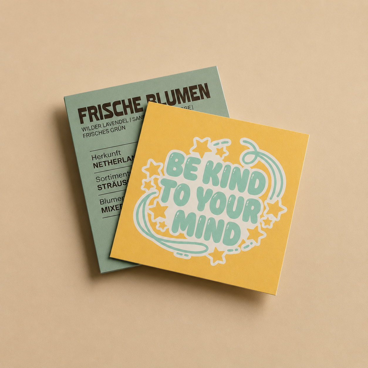 Custom square stickers with a yellow Be Kind design displayed on a neutral background