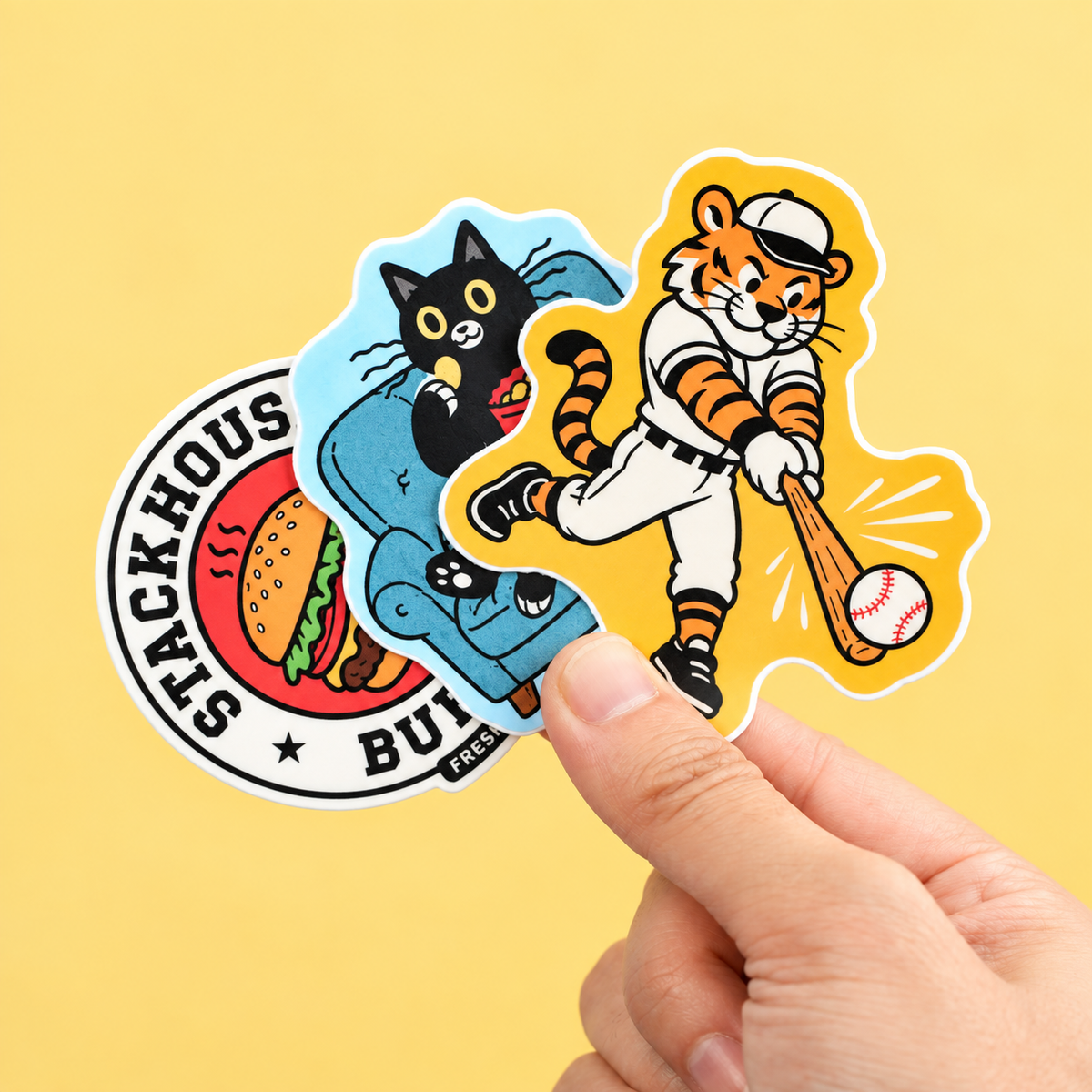 Custom any shape die cut vinyl stickers with colorful artwork, printed designs, and precise custom cut edges.