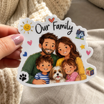 Close-up of a person holding a custom waterproof family reunion sticker featuring a detailed illustrated family with a puppy.