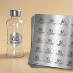 Professional custom silver foil labels with a refined industrial look on grooming product bottles, ensuring a cohesive and sophisticated brand presence.