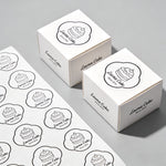 die cut sheet labels for bakery packaging with custom logo stickers on cake boxes