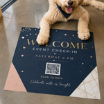 Large square navy and gold event welcome floor decal with a scannable QR code for RSVP, featuring a dog's paws resting on the edge for a lifestyle demonstration.