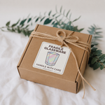 Fragile glassware packaging sticker on a kraft shipping box