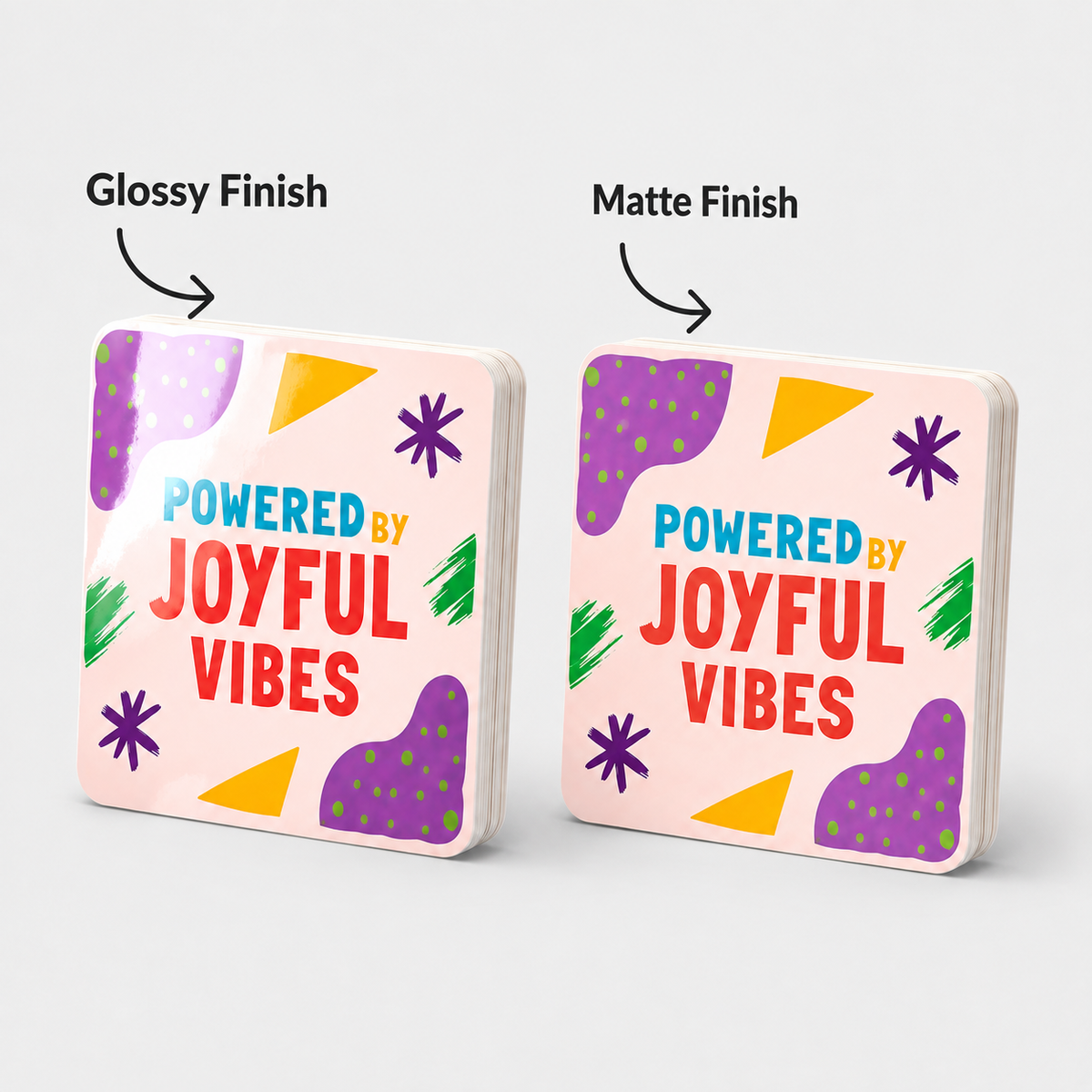 Comparison of glossy and matte finish options for custom vinyl sticker stacks featuring colorful abstract designs.