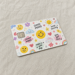 Good mood credit card sticker with cute smiling suns, clouds, and positive text quotes, a vibrant debit card skin.