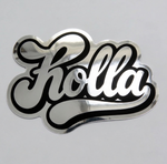 Metallic 'Holla' sticker in a glossy finish, reflective effect on a gray background