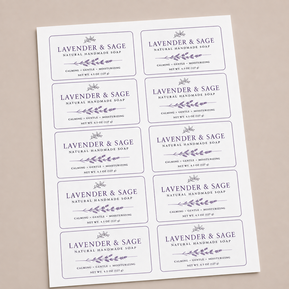 Custom rounded corner labels featuring a lavender and sage natural soap design on a sticker sheet.