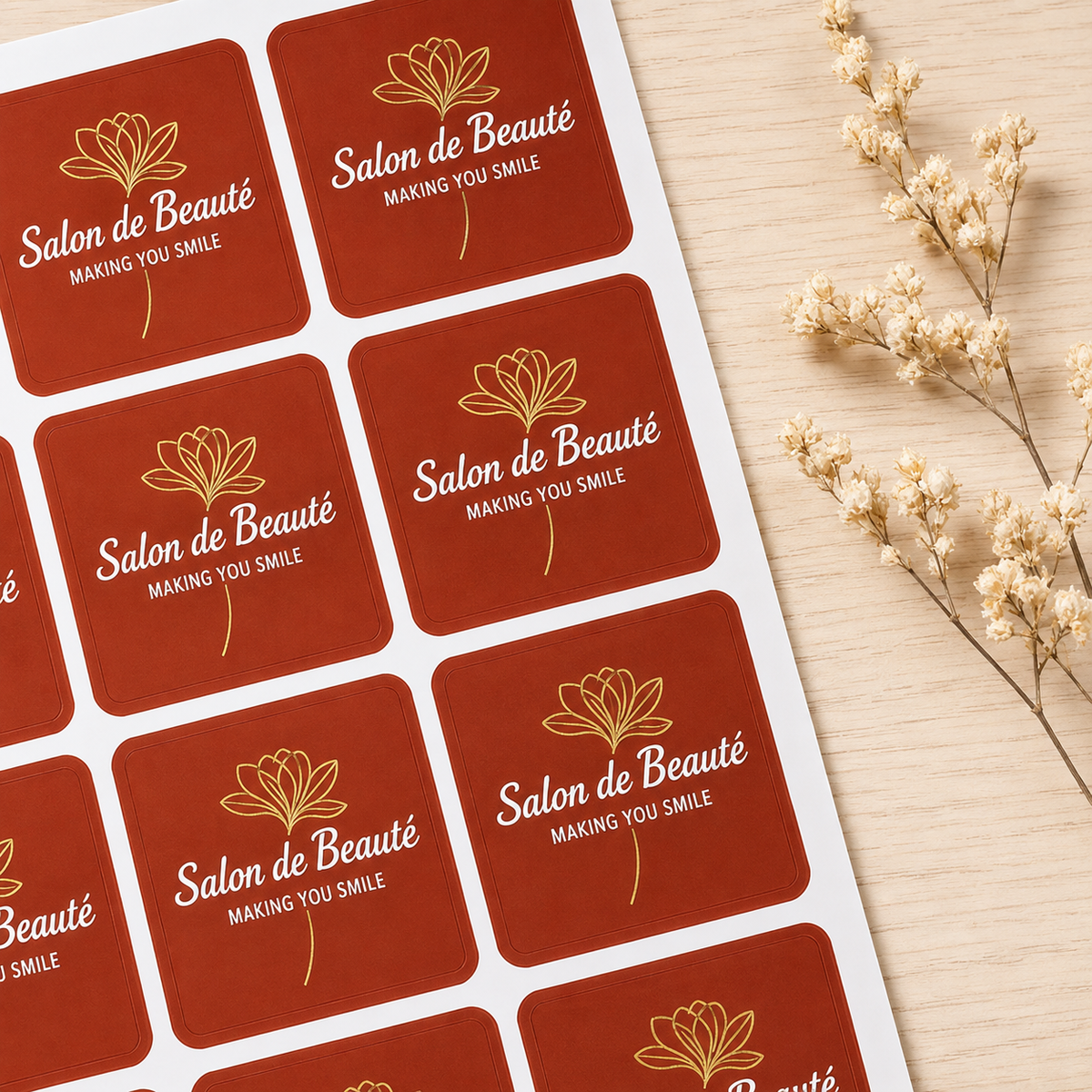 Orange rounded corner sheet labels for salon branding, custom printed beauty stickers arranged on label sheets