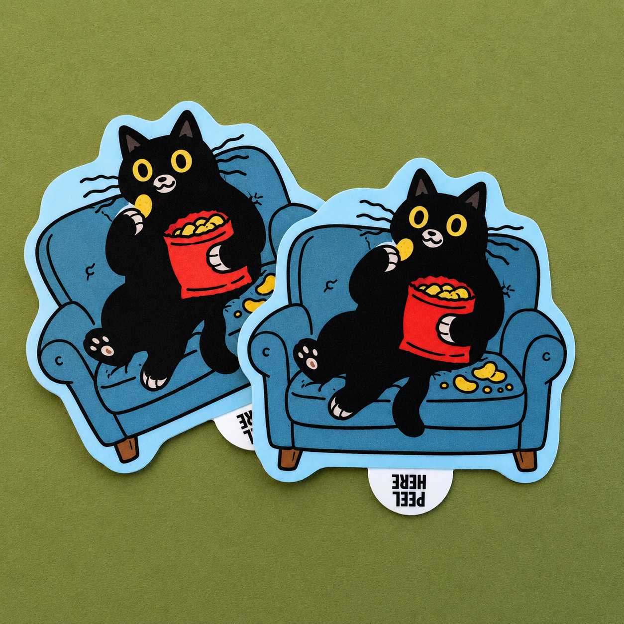 Custom peel tab stickers showing a black cat relaxing on a couch with snacks against a green background.