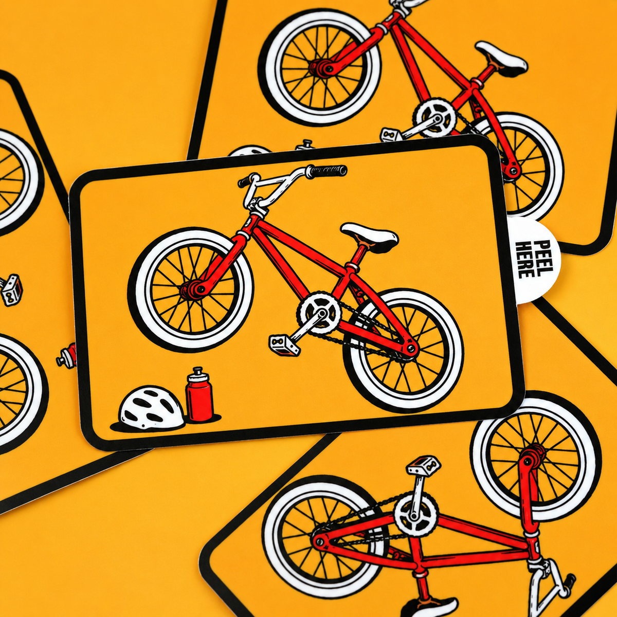 Custom peel tab stickers featuring a red bicycle illustration on a bright orange background.