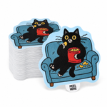 Stack of custom peel tab stickers featuring a black cat eating chips on a blue couch with a peel here tab.