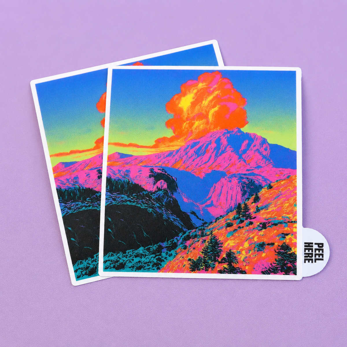 Colorful volcano landscape peel tab stickers with a peel-here tab, shown against a soft purple background.