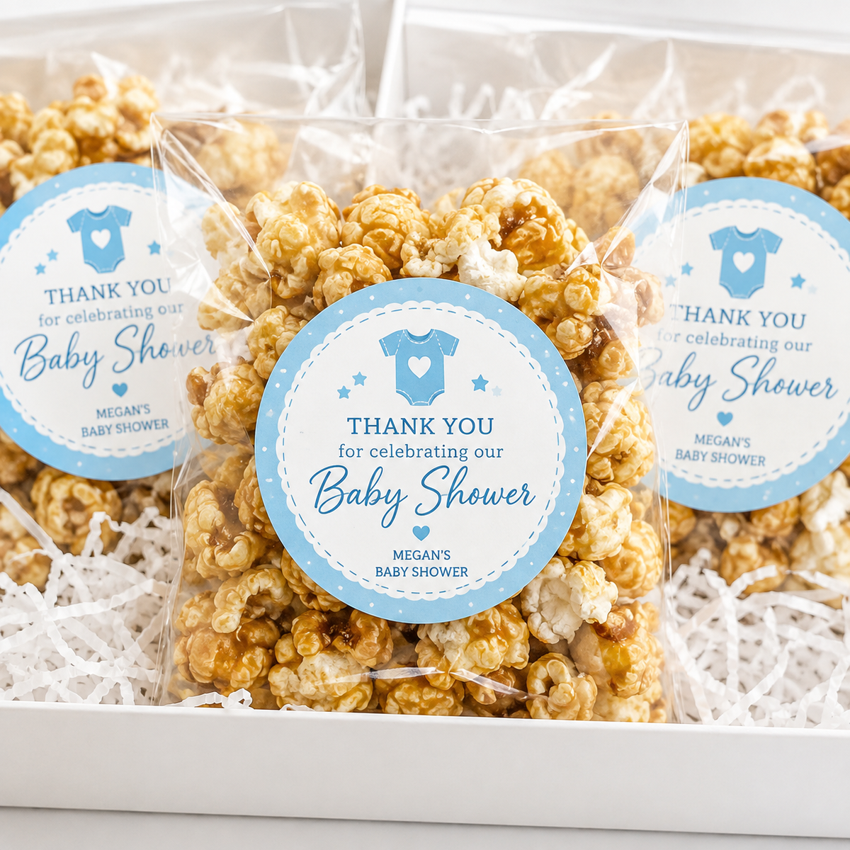 Personalized baby shower favor labels on clear snack bags for guests