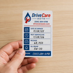 Personalized Drive Care Auto service sticker displaying date, mileage, oil grade, and phone number.