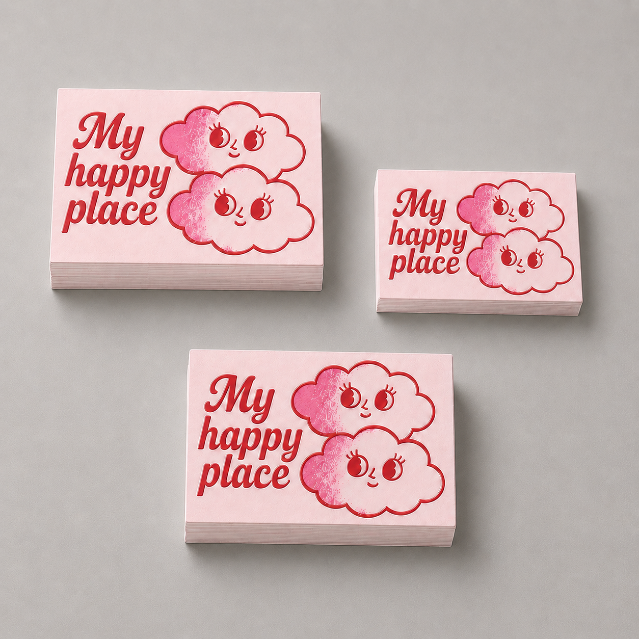 Pink rectangle sticker stacks with My Happy Place cloud design