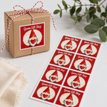 Red square labels used on a kraft gift box with matching labels on a sheet