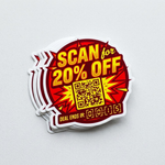 A stack of vinyl stickers in vibrant red and yellow, featuring a 'Scan for 20% OFF' explosive design with a QR code and a countdown timer.