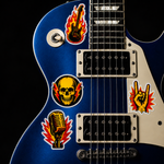 Custom band stickers featuring a skull, microphone, guitar, and rock hand sign on a blue electric guitar body.