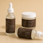 Custom waterproof labels for packaging with skincare serum and cream designs applied on wet cosmetic containers.