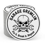 Stack of metallic Sticker with skull and crossed wrenches design, featuring 'Garage Gremlin' text.