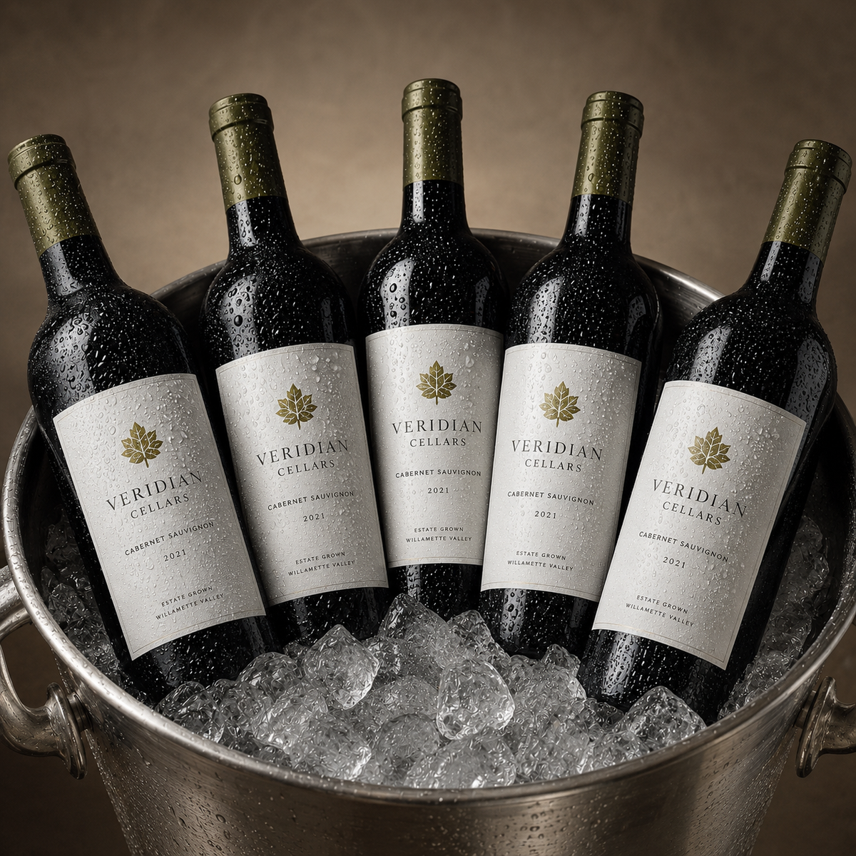 Custom waterproof labels for packaging with Veridian Cellars wine design applied on bottles chilling in an ice bucket.