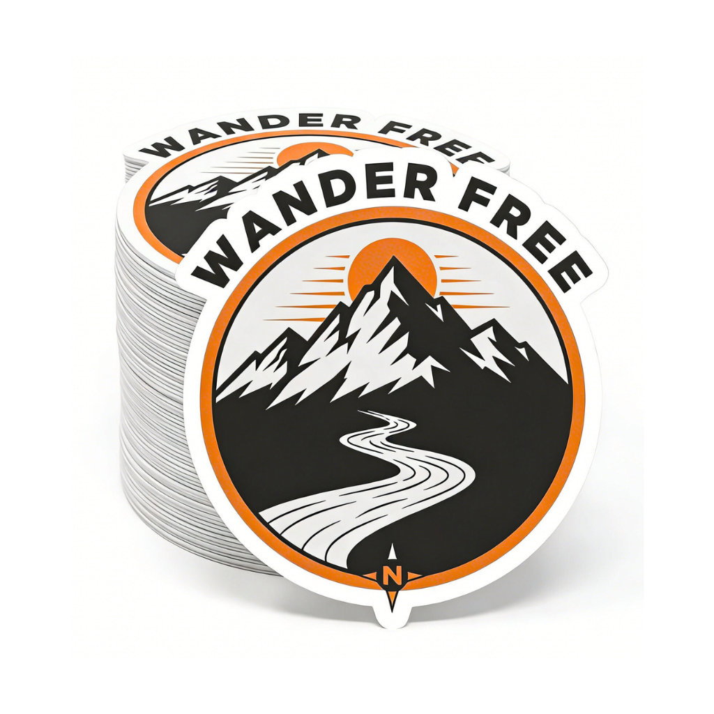 Stack of Wander Free mountain vinyl die cut stickers showing design and quantity