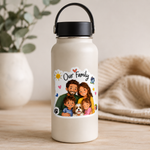 A custom family photo sticker with sun and house illustrations applied to a white reusable water bottle