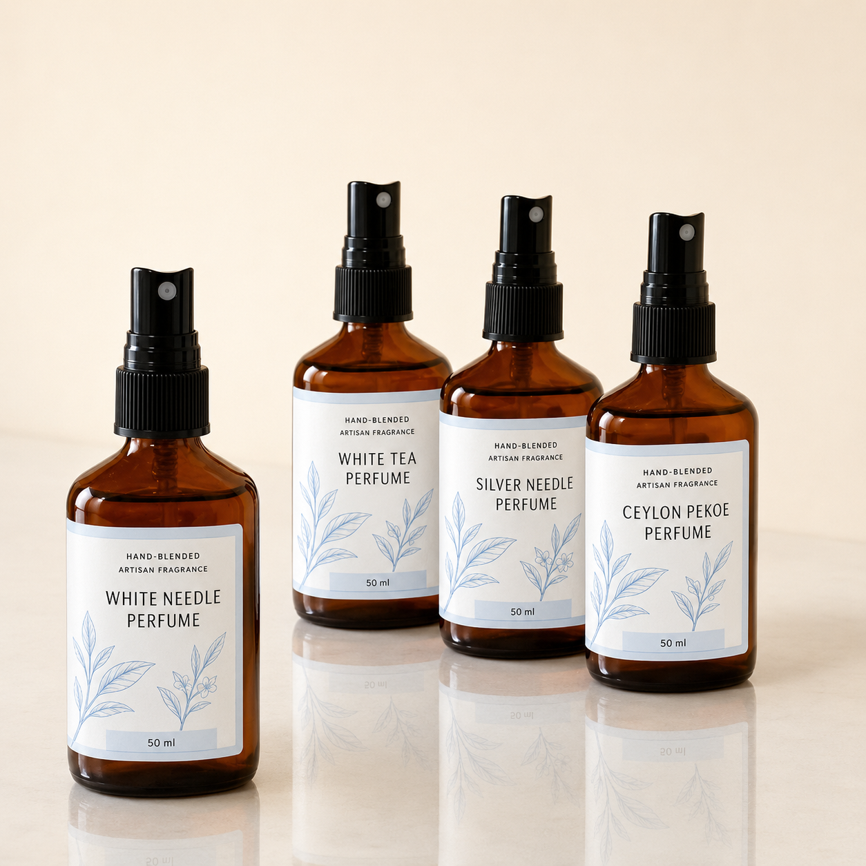 White vinyl cosmetic product labels on a hand-blended artisan perfume line in amber glass spray bottles
